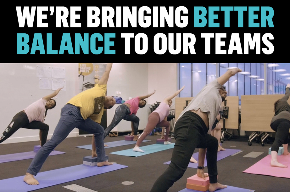 A group of people doing yoga
